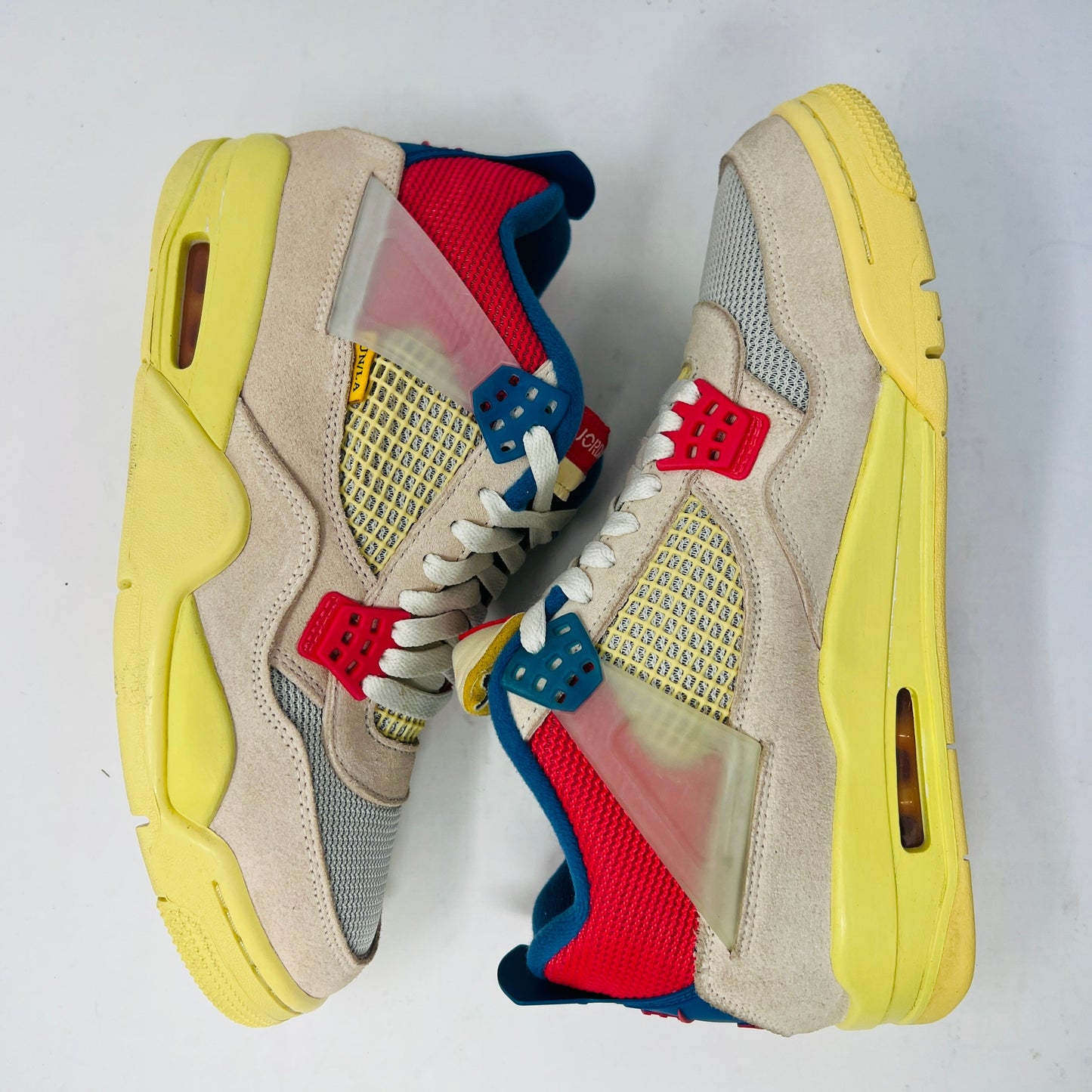 Jordan 4 Retro Union Guava Ice